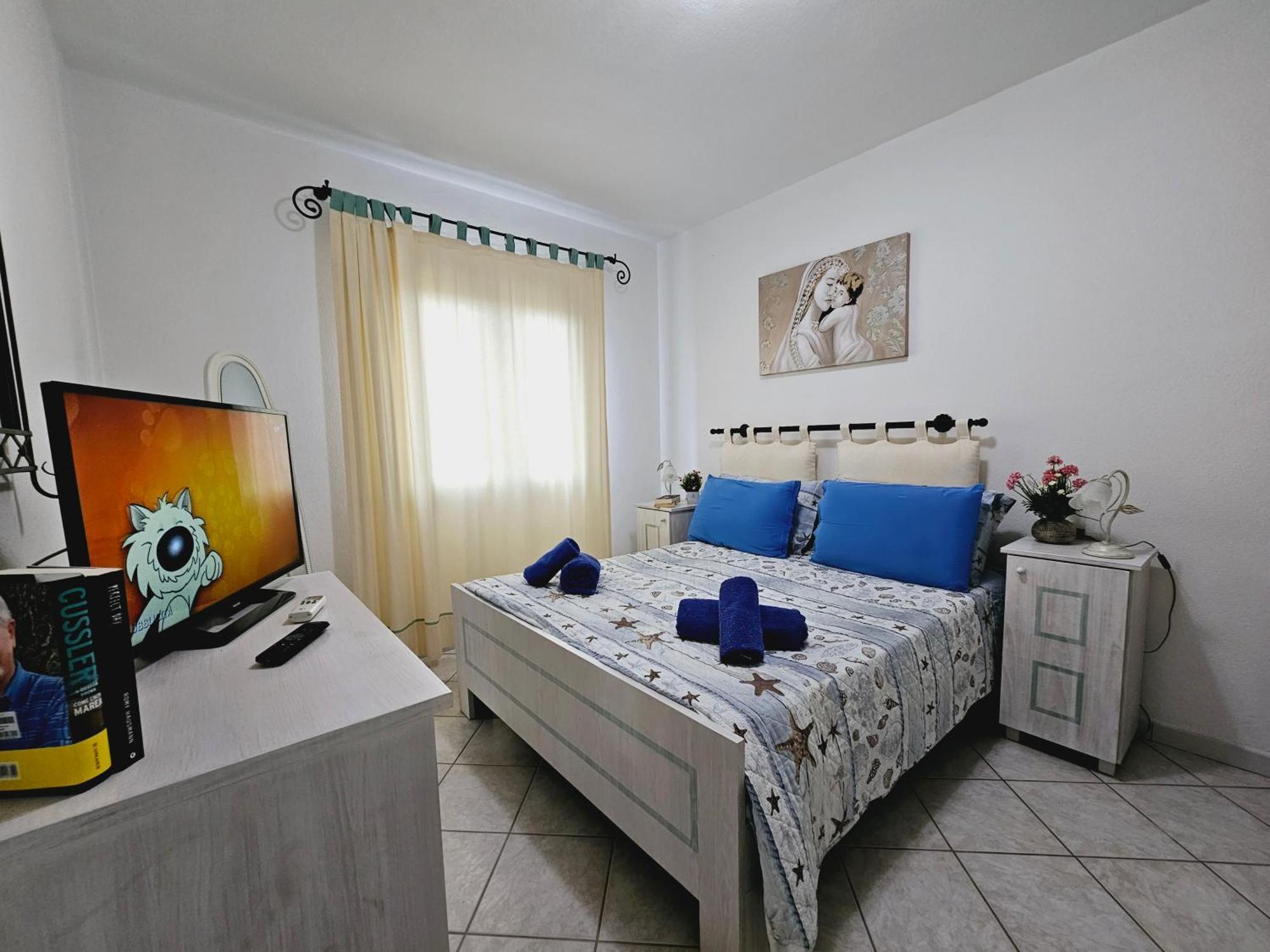 Апартаменты La Residenza Del Porto Санта-Тереза-Галлура Номер фото