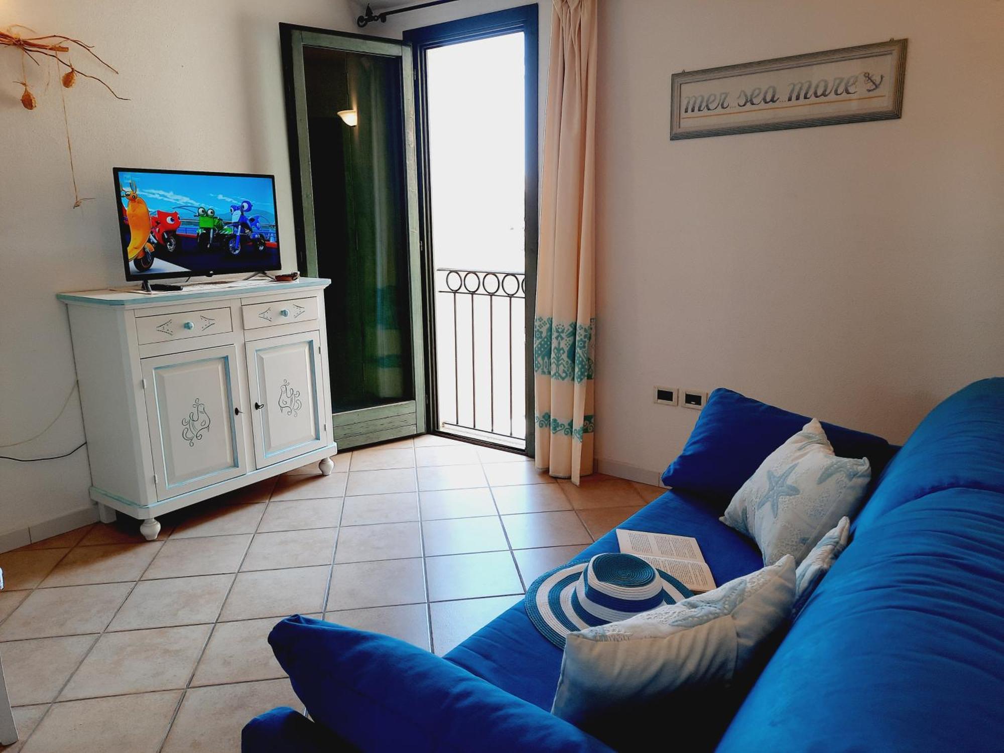 Апартаменты La Residenza Del Porto Санта-Тереза-Галлура Номер фото